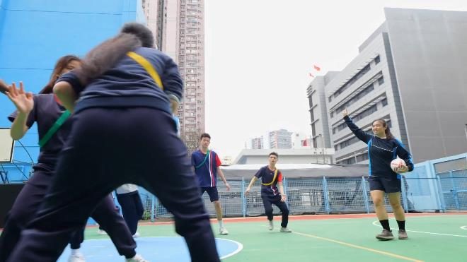 Mary teaching rugby at a school for the deaf