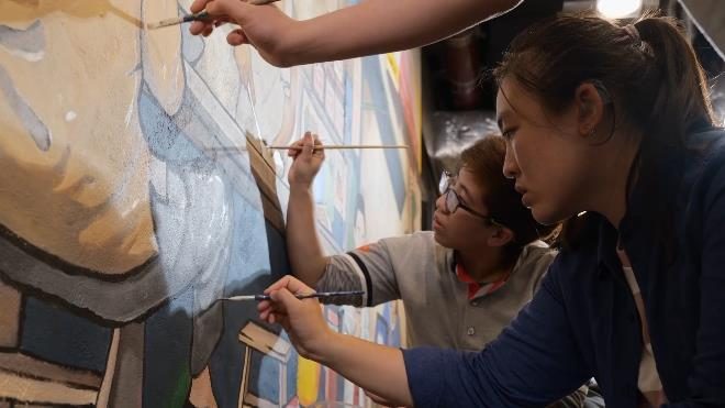 Mary teaching drawing and restoring murals