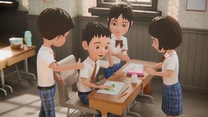 Leon and classmates working together at their desks