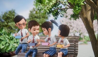 Leon and classmates sitting together outdoors